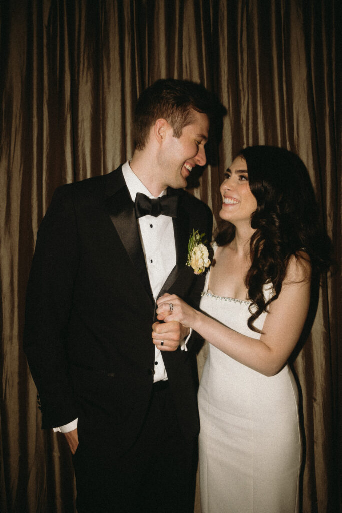 Bride and Groom in Sepia's private dining event space